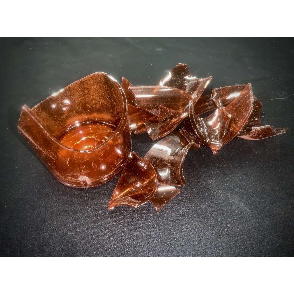 Amber breakaway bottle shards prop